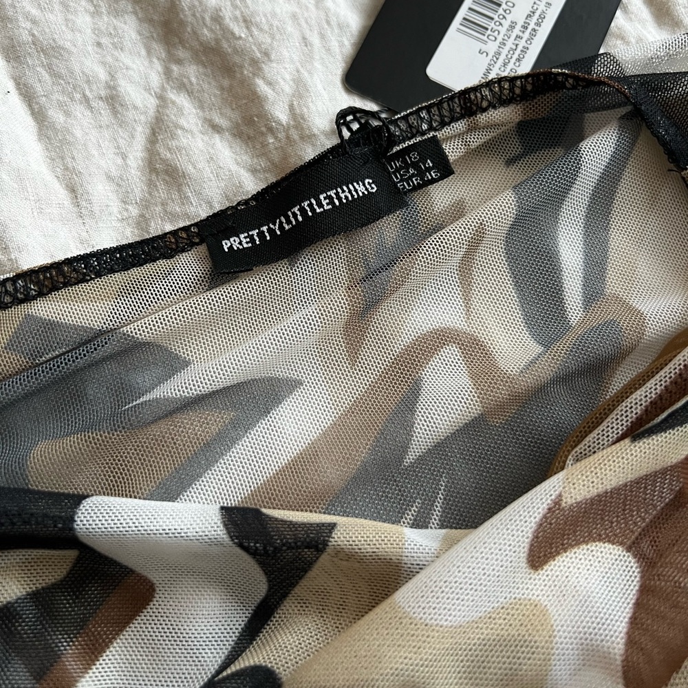 Chocolate abstract print mesh crossover bodysuit 😍